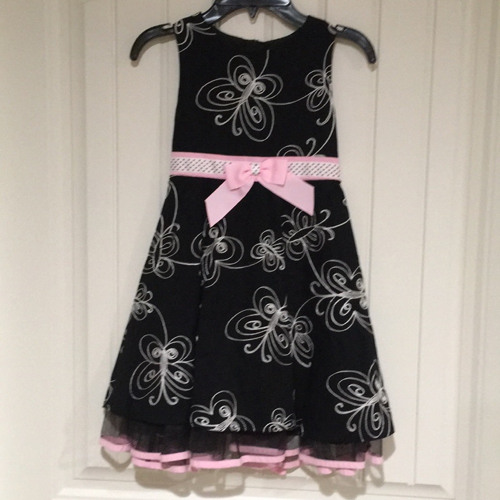 Beautiful girls dress with butterflies